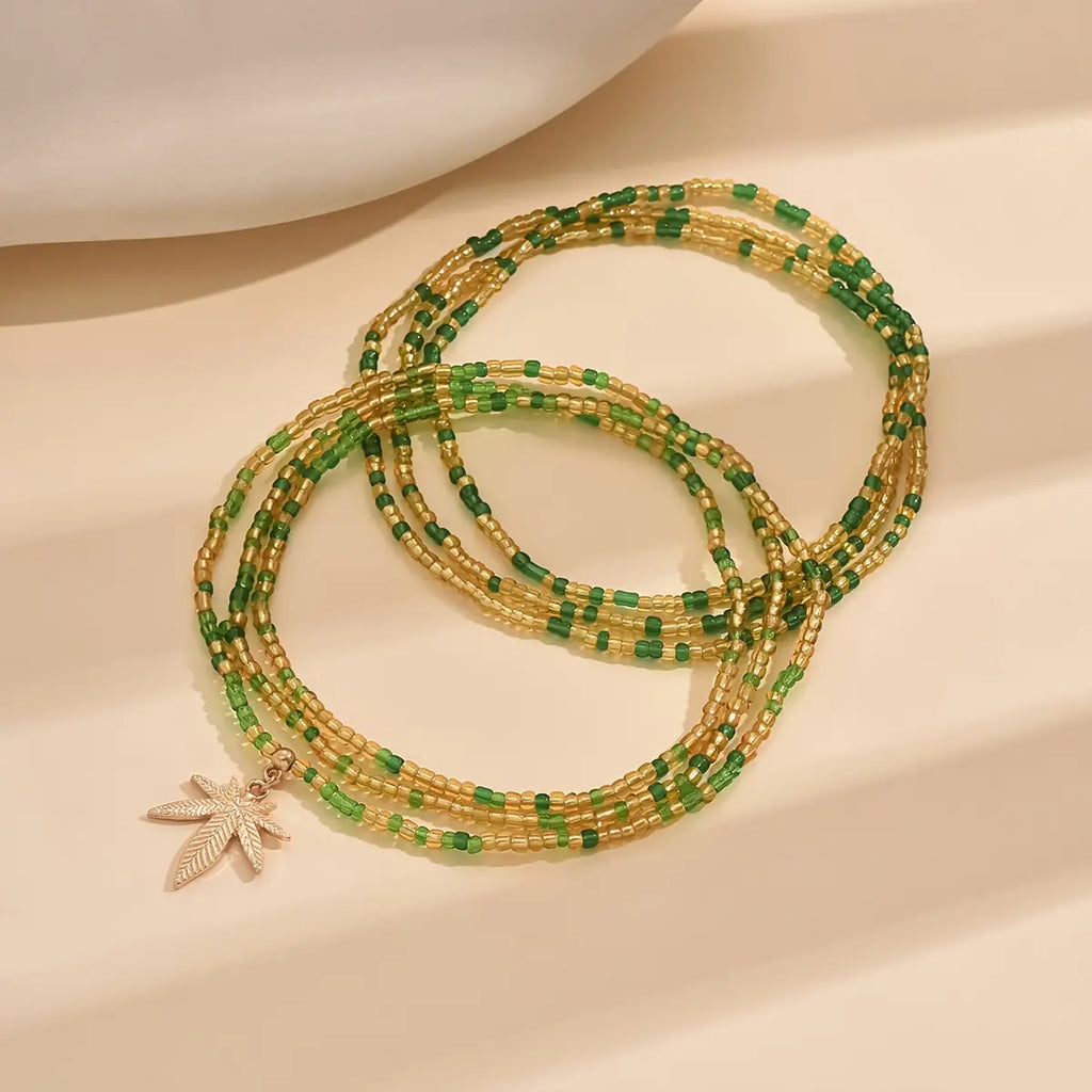 2Pcs Maple Leaf Pendant Anklet Set, Bohemian Colorful Beads Stackable Ankle Bracelet, Green Beads Multi-layer Mini Seed Beads Elastic Foot Chain Bracelet, Vacation Travel Summer Beach Foot Bracelet Jewelry