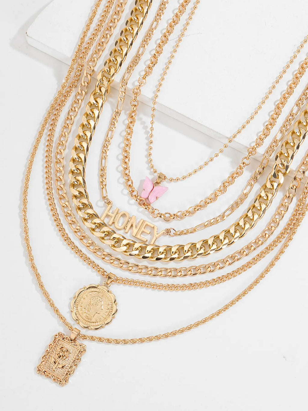 7-Piece Golden Layered Y2K Necklace Set with 'HONEY' Letter, Butterfly & Coin Charms Edgy Chic Accessory, Fashion Matching Boho Style Necklace for Daily, Party & Music Festival